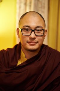 Before teachings, Kalu Rinpoche grants a few minutes for a portrait session at Kagyu Dzong Dharma Center in Paris, November 2013.